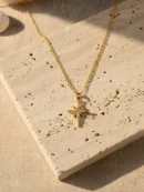 Starlume North Star gold tone pendant necklace with crystal detailing – elegant fashion jewellery by Elanàm