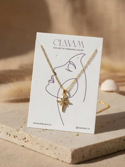 Starlume North Star gold tone pendant necklace with crystal detailing – elegant fashion jewellery by Elanàma